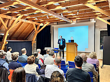 Referent und Publikum bei einem Vortrag